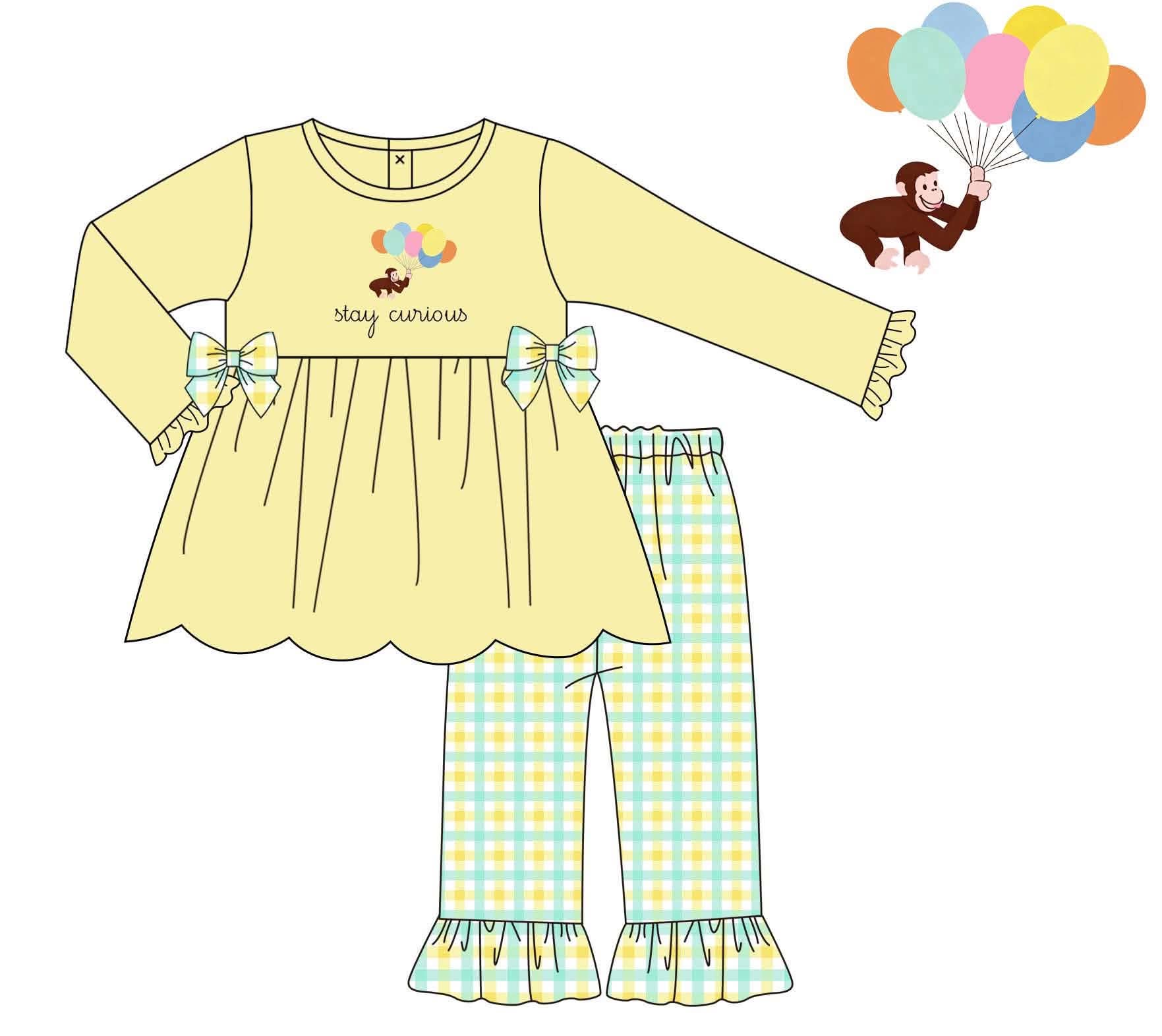 A children's two-piece set shown as a flat illustration on a white background. The set includes a pale yellow long-sleeve top with bow details and a scalloped hem, paired with light blue and yellow plaid pants with ruffled hems.